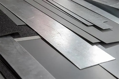Galvanized sheet metal stored on shop racks