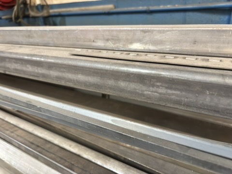 Structural tube, flat bar, and duct flange rings on cantilever rack